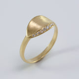 18K yellow gold Daphne laurel leaf ring with brushed finish and diamond accents