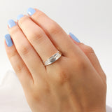 Inspired by the Greek myth of the goddess Daphne and her transformation into the laurel tree, this ring is crafted in sterling silver as a symbolic representation of the laurel leaf—an enduring emblem of triumph and achievement.
The sculptural leaf gently folds around the finger, forming an elegant and fluid band that echoes the organic beauty of nature.
Designed to be worn alone or stacked, this piece is a graceful expression of handcrafted artistry and mythological inspiration, blending timeless symboli