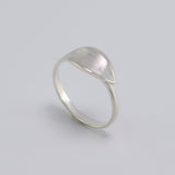Inspired by the Greek myth of the Goddess Daphne and her embodiment of the laurel tree, this ring is crafted in sterling silver to represent a laurel tree leaf, a symbol of triumph. The leaf has a brushed matte finish. This is a delicate and graceful piece and pairs perfectly with the rest of the Daphne Collection.