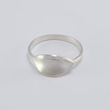 Inspired by the Greek myth of the Goddess Daphne and her embodiment of the laurel tree, this ring is crafted in sterling silver to represent a laurel tree leaf, a symbol of triumph. The leaf has a brushed matte finish. This is a delicate and graceful piece and pairs perfectly with the rest of the Daphne Collection.